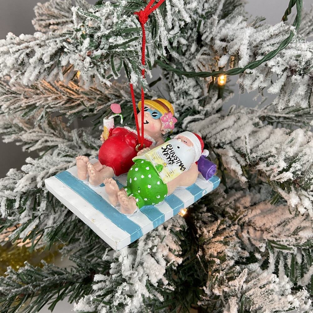 Christmas Ornament- Santa With Ms Clause Laying Out On The beach . -Cape Shore